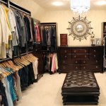walk-in closet, man closet, leather bench